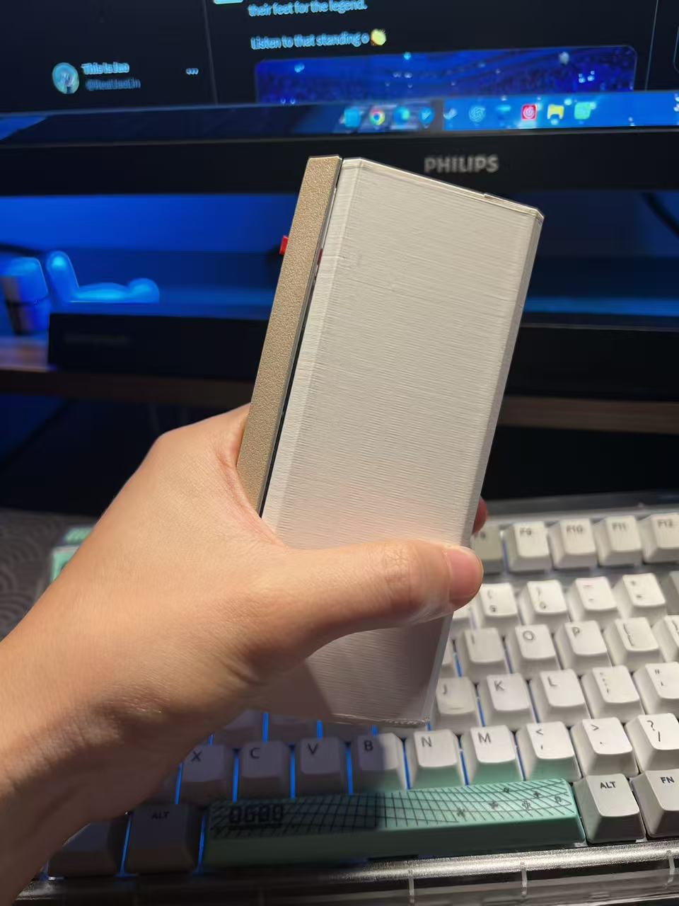 FLUXEN ONE appearance prototype held in a hand